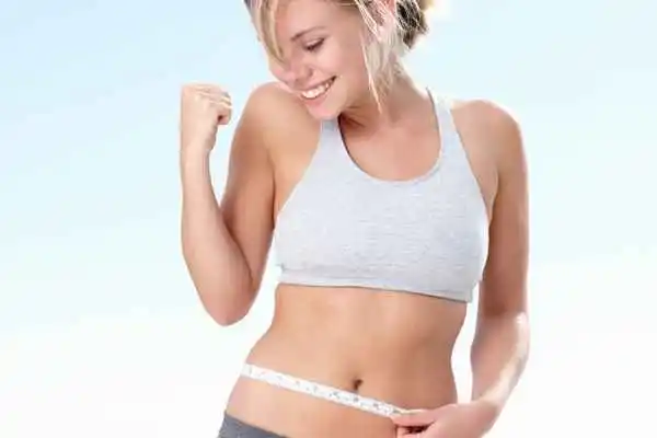 woman happy after fat reduction treatment Greater London (Waltham Forest)