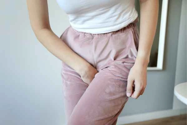 older woman running to the toilet because of urinary incontinence Greater London (Waltham Forest)